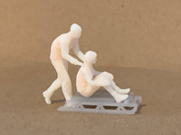 Snow Sledding Couples
